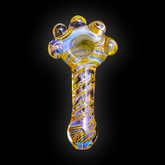 A glass pipe with swirls and a black background