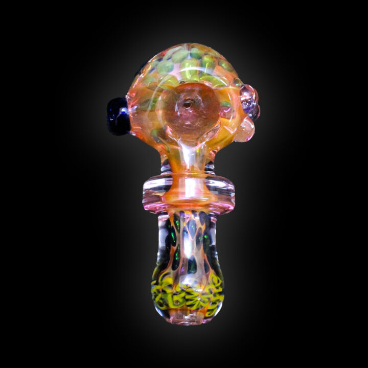 A glass pipe with a picture of a person inside it.