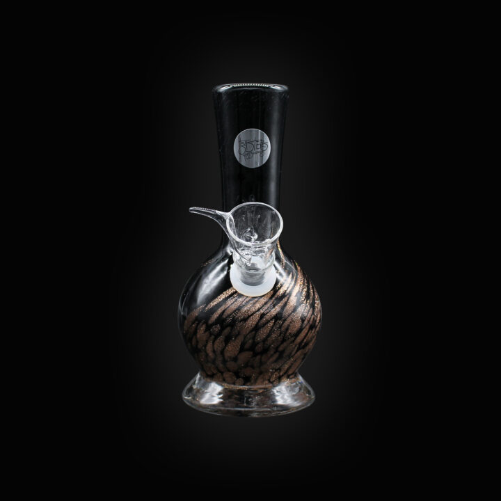 A glass water pipe with a black and white pattern.