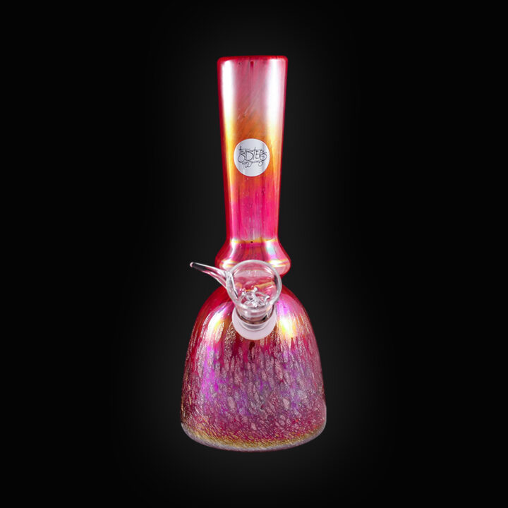A pink glass bong with a purple and yellow design.