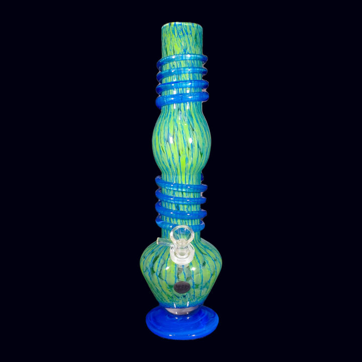 A blue and green glass hookah pipe sitting on top of a table.