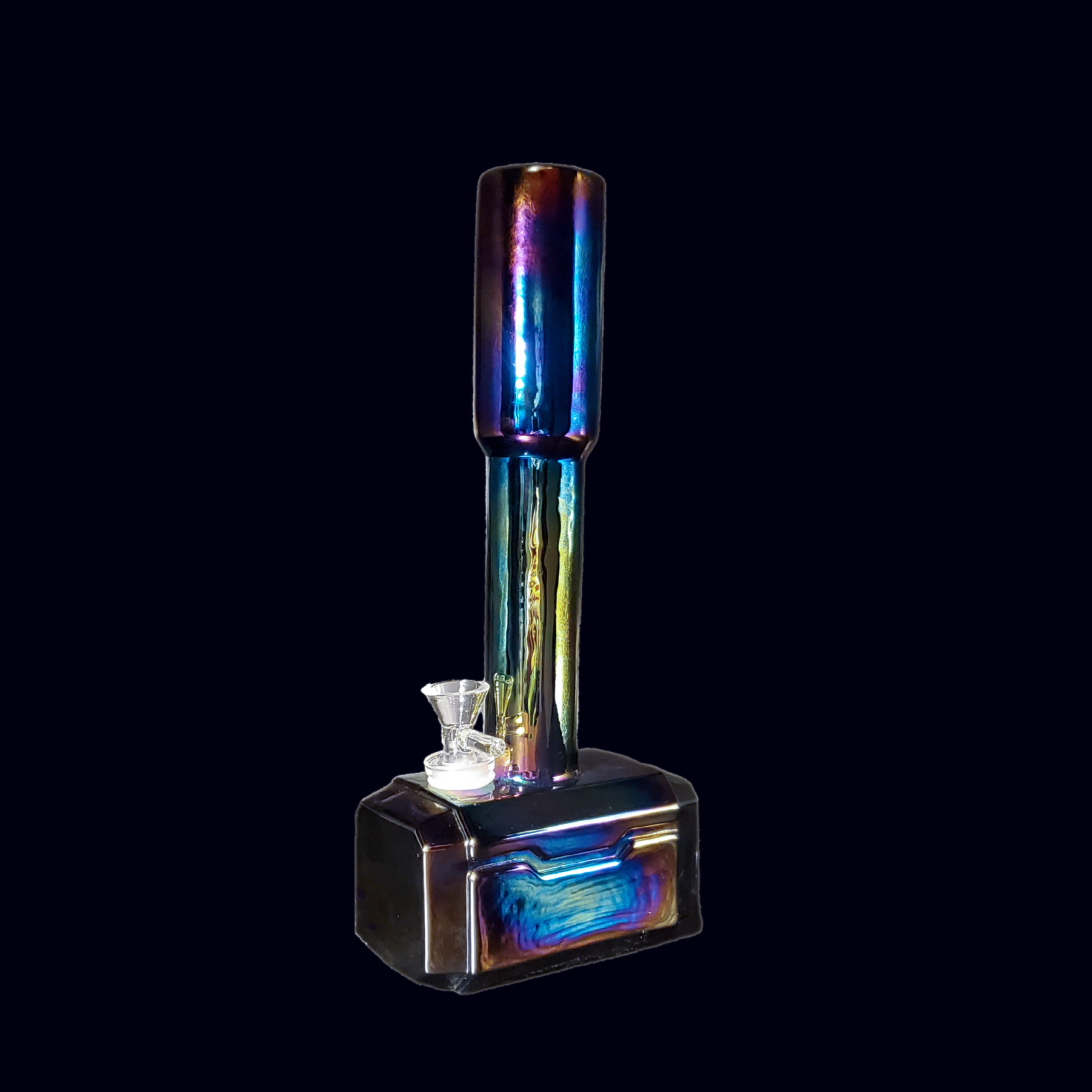 A colorful glass object with a tissue dispenser.