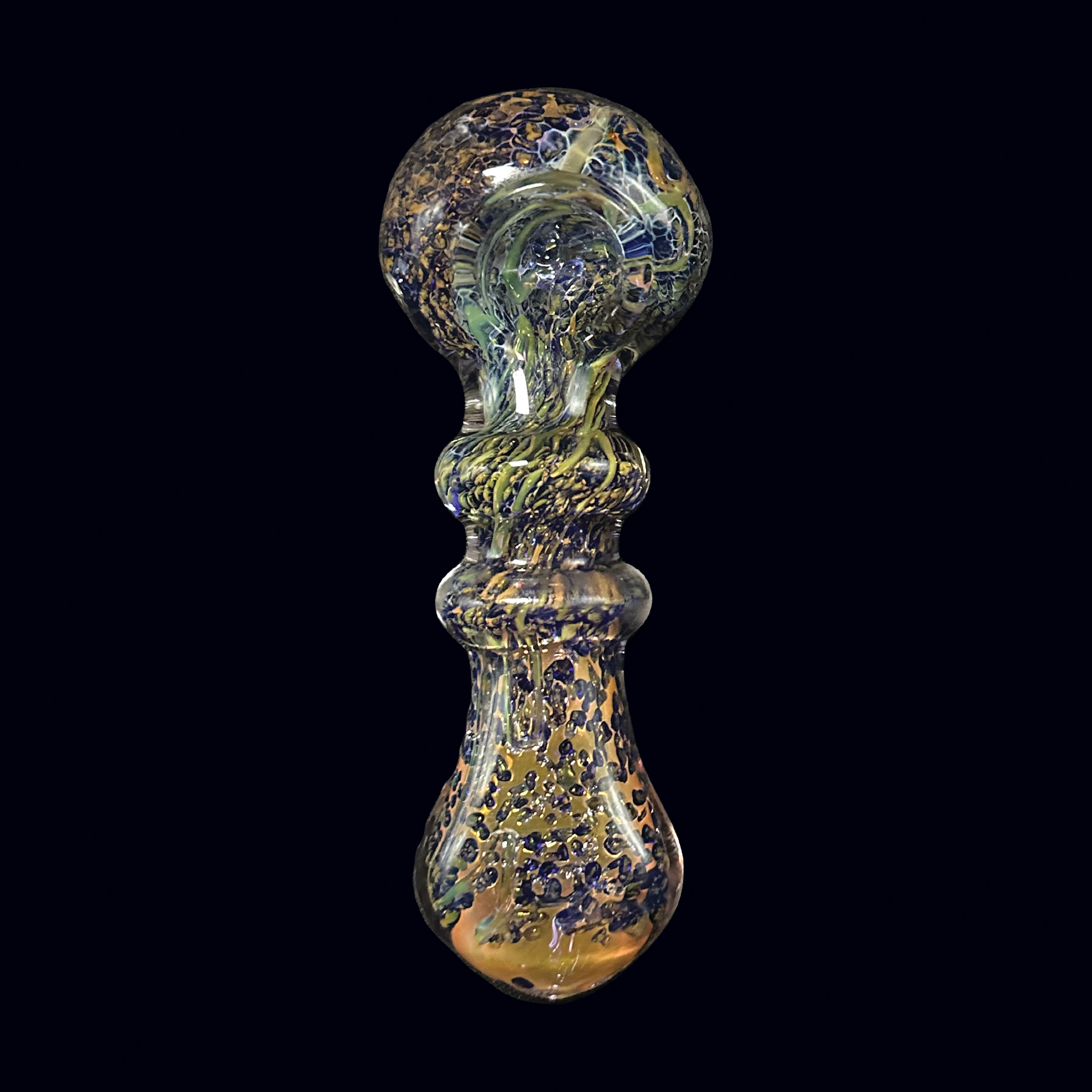 A glass pipe with blue and yellow speckles on it.