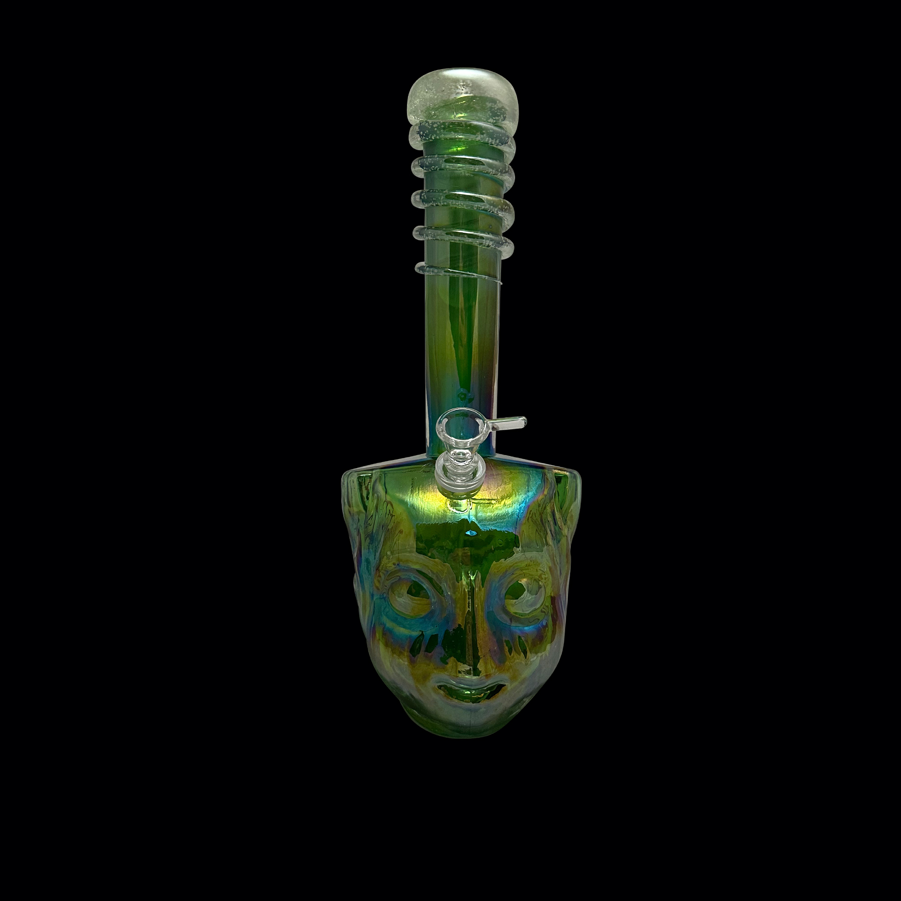 A green glass pipe with a face on it.