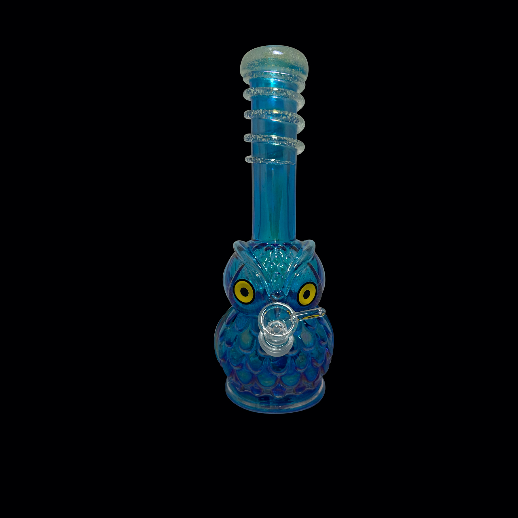 A blue owl shaped glass pipe sitting on top of a table.